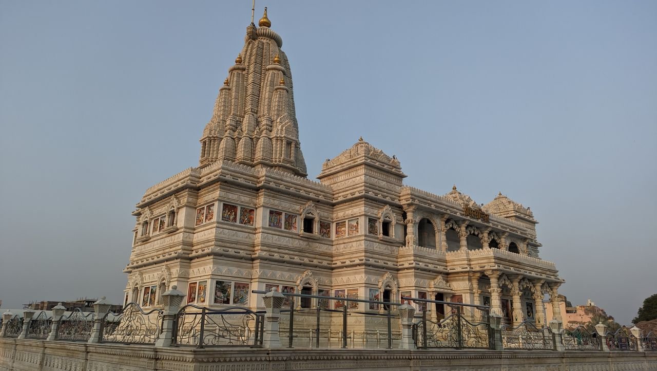 A majestic view of Prem Mandir, a Hindu temple in Vrindavan, showcasing intricate architecture.